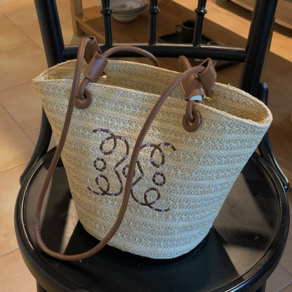 A straw bag shoulder bag