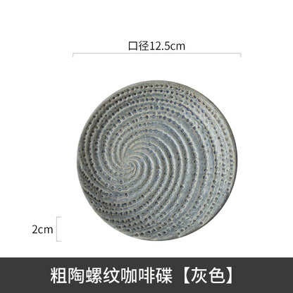 A creative ceramic cup and saucer