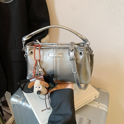 A handbag messenger bag