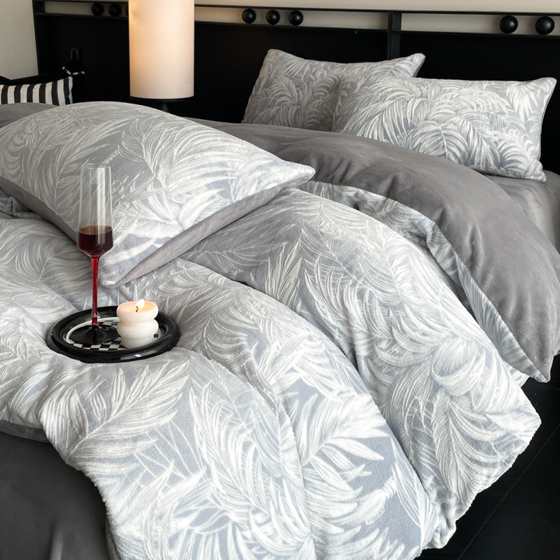 A four-piece quilt cover on the bed