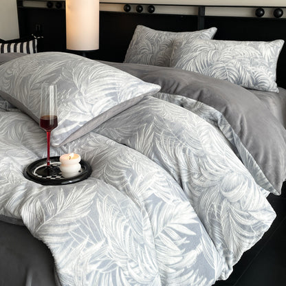 A four-piece quilt cover on the bed