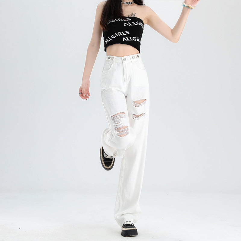A pair of ripped white jeans