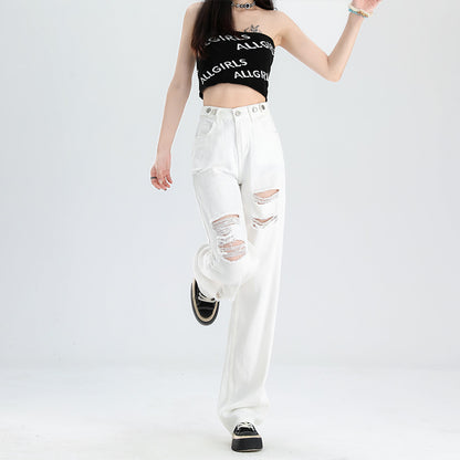A pair of ripped white jeans