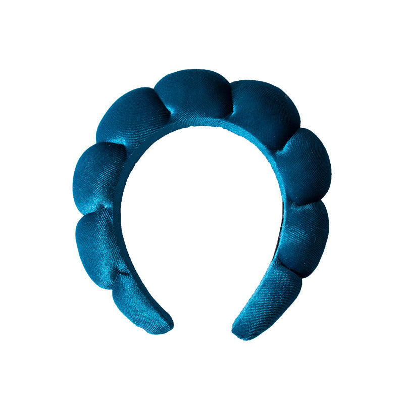 A towel fleece sponge twist headband