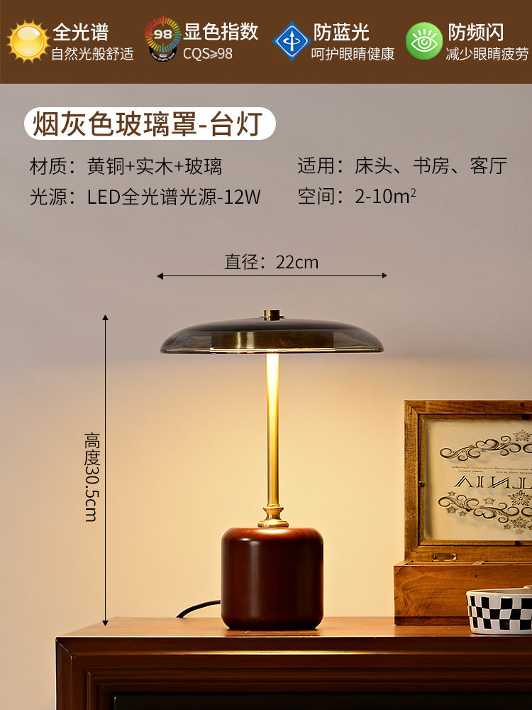 A solid wood glass table lamp