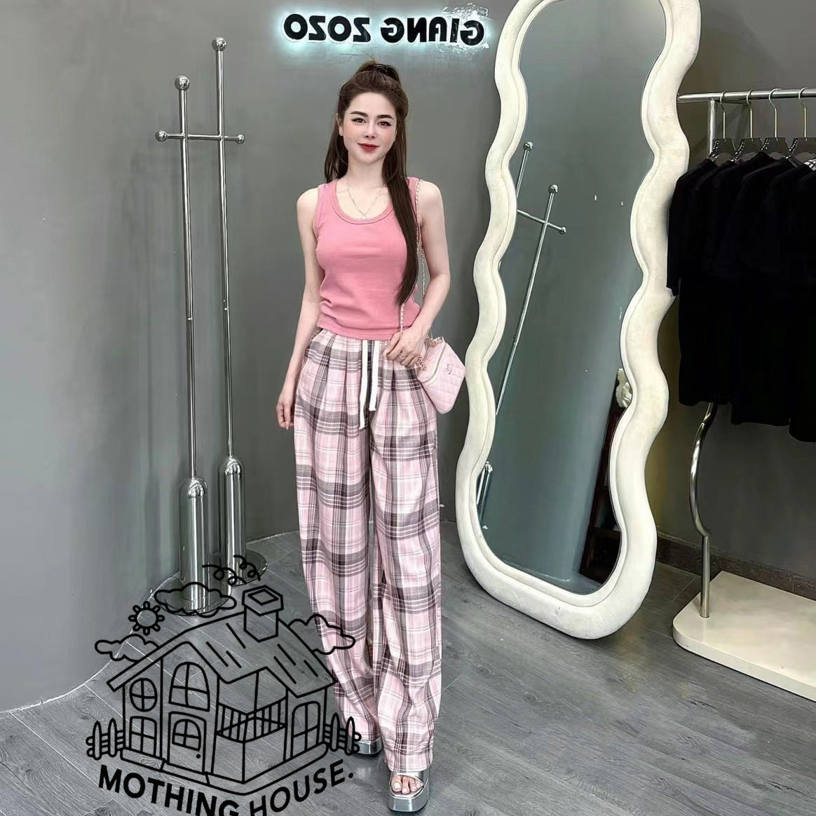 A sports suit women's summer new solid color sleeveless vest top with plaid wide-leg pants casual two-piece trendy