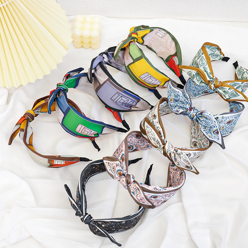 A Korean version of the new product headband fashion calico geometric wide edge headgear hair bundle go out bow hairpin