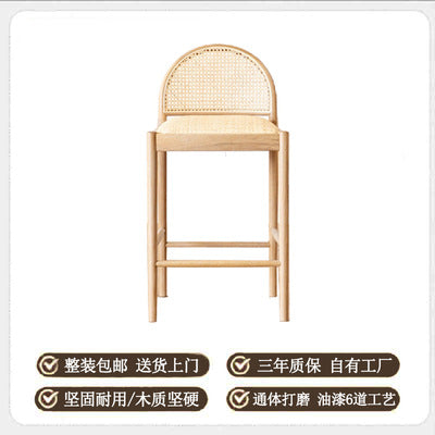 A solid wood rattan chair