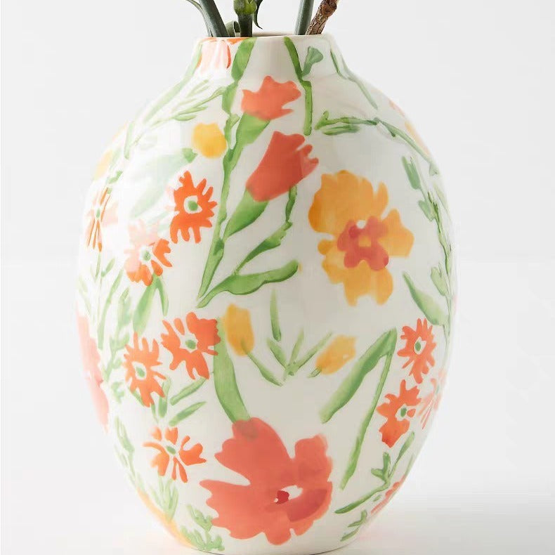 A colorful hand-painted ceramic vase ornament
