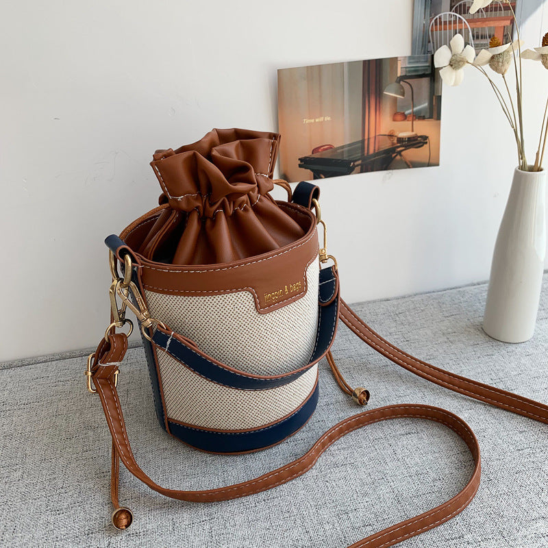 A hand-held cylindrical shoulder bag trendy retro canvas contrasting messenger bag - Mixbatch