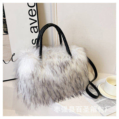 A Plush raccoon fur handbag