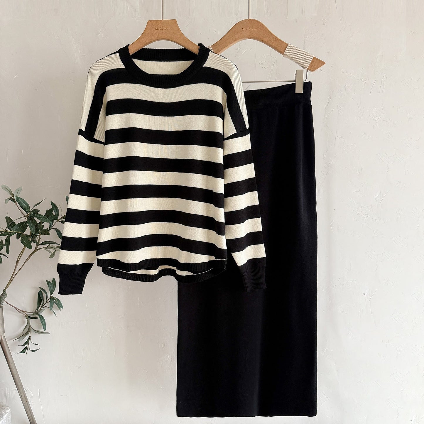 A Knitted long-sleeved top skirt two-piece set