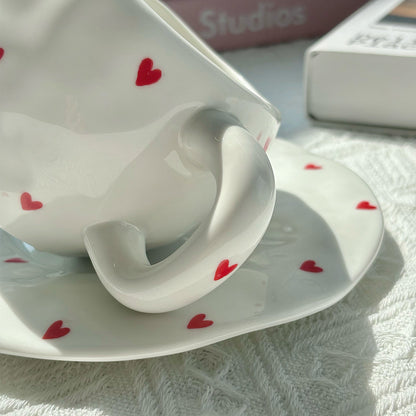 A love irregular ceramic cup and saucer set