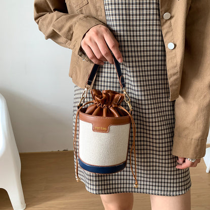 A hand-held cylindrical shoulder bag trendy retro canvas contrasting messenger bag - Mixbatch