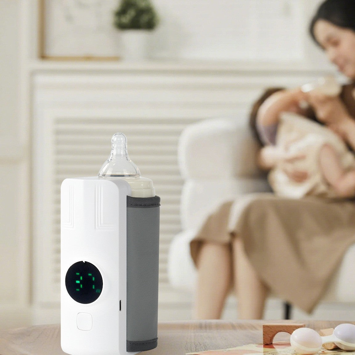 A Portable rechargeable thermostatic milk heater