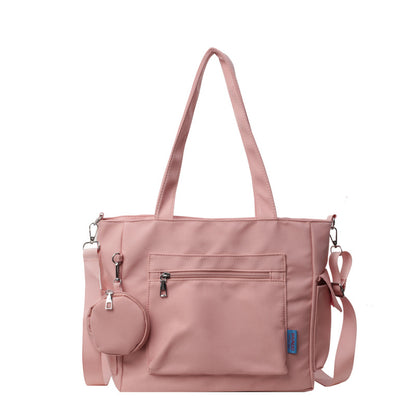 A new solid color canvas bag women's large-capacity shoulder bag student versatile tote bag hand bag messenger cloth bag