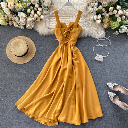 A backless solid color waist V-neck long dress women's dress