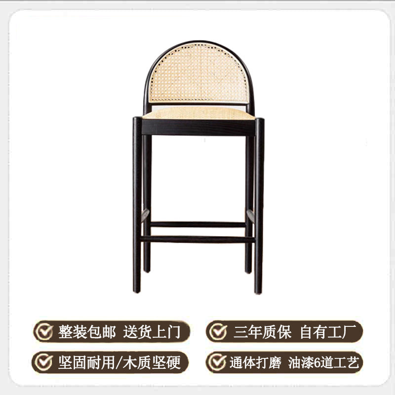 A solid wood rattan chair