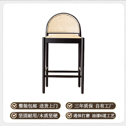 A solid wood rattan chair