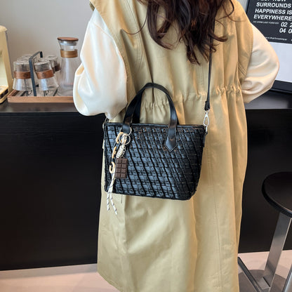 A handbag women's messenger bag