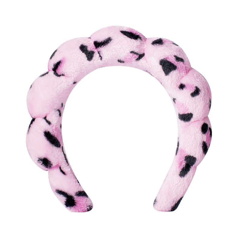 A towel fleece sponge twist headband
