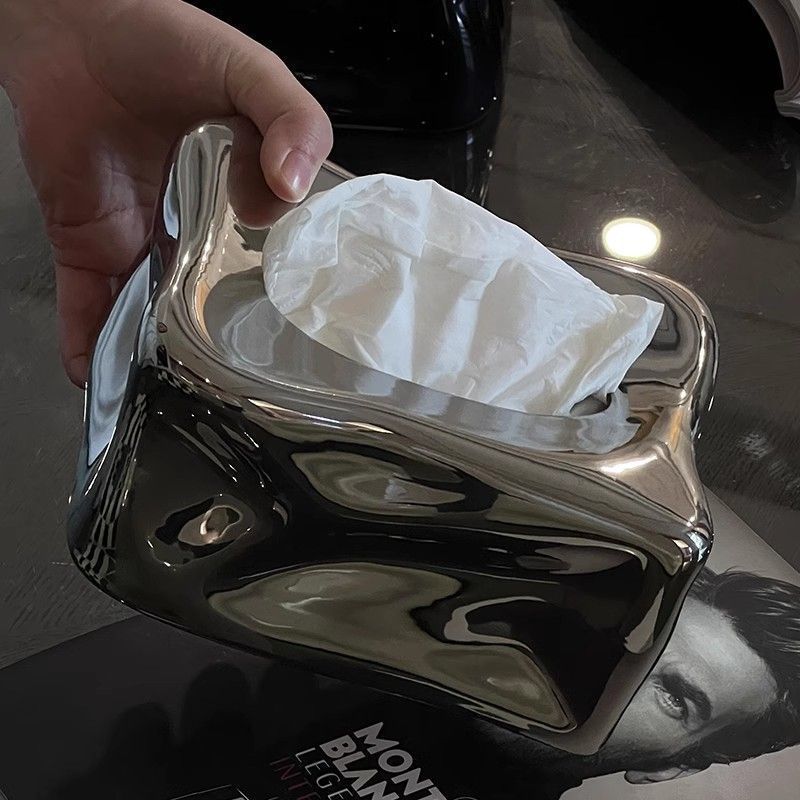 A ceramic tissue box decorative ornament