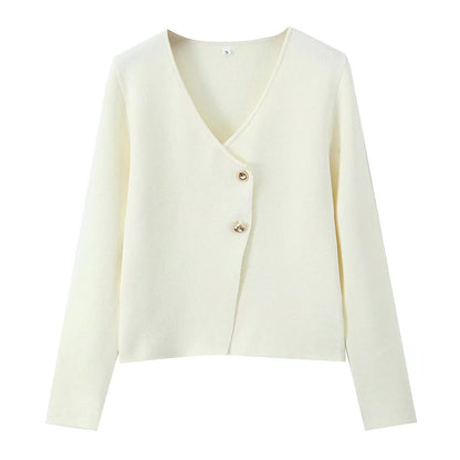 A button-down long-sleeved knit top