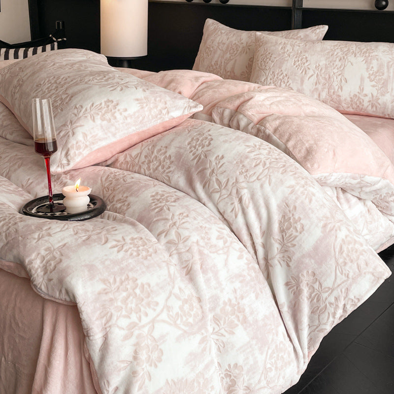 A four-piece quilt cover on the bed