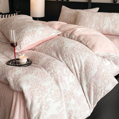 A four-piece quilt cover on the bed