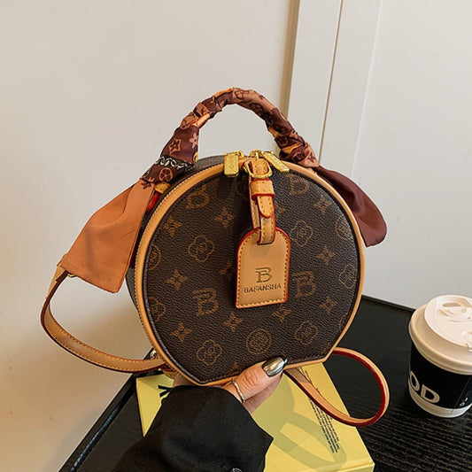 A new high-end printed apple bag niche light luxury fashion versatile shoulder messenger bag portable round cake bag