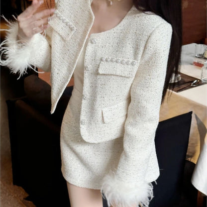 A Spring and Autumn Celebrity Splicing Button Bead Tassel Design Jacket New Fashion Small Fragrant Skirt Two-piece Set