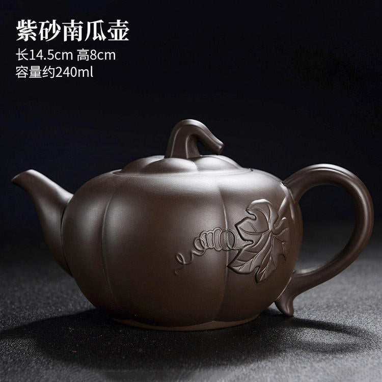 A purple clay pot teapot