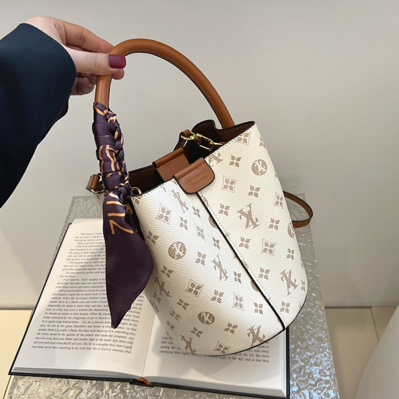 A high-end women's bag, new fashion printed mother and child bucket bag, versatile single shoulder crossbody portable cross-border bag