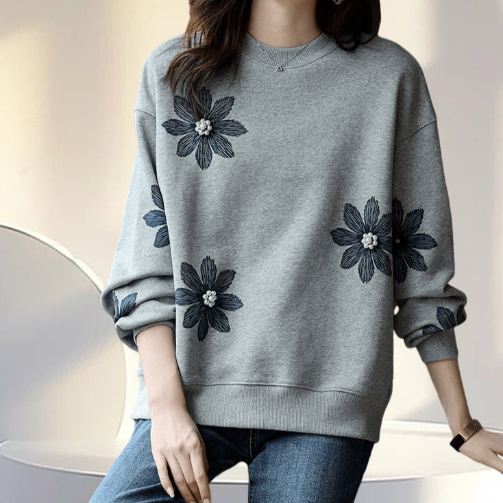 A flower beaded sweater