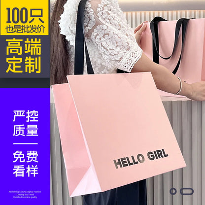 A clothing store tote bag custom paper bag premium sense printing logo high-end ins style high value women's clothing store shopping bag