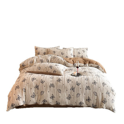 A four-piece quilt cover on the bed