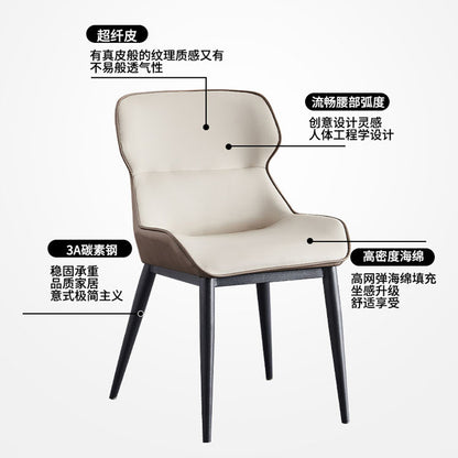 A wrought iron leather chair seat