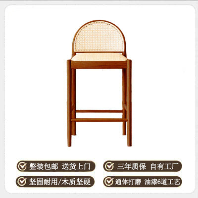 A solid wood rattan chair