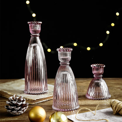 A glass candlestick ornament