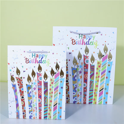 A happy birthday gift paper bag cake wrapping paper bag balloon candle shopping bag spot wholesale plush toy bag