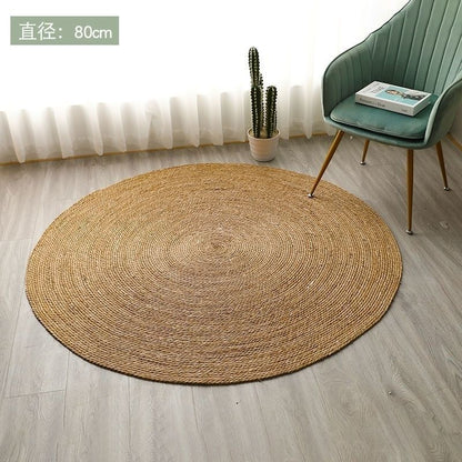 A handmade grass rattan woven carpet floor mat