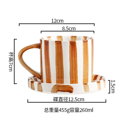 A ceramic coffee cup and saucer set