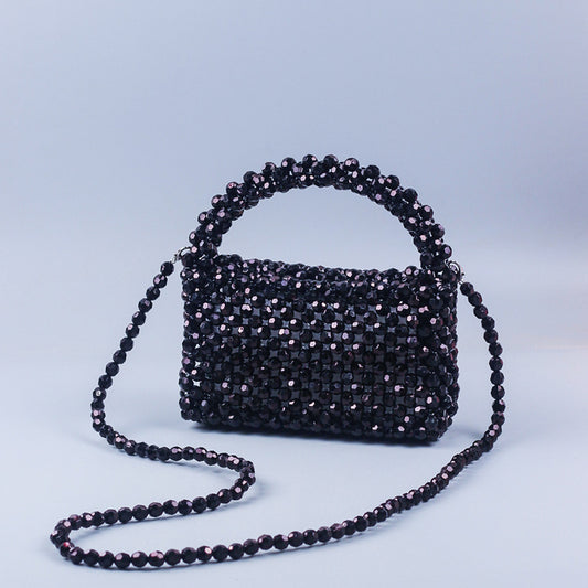 A simple black horn bead acrylic handbag bag handmade beaded woven portable messenger bag