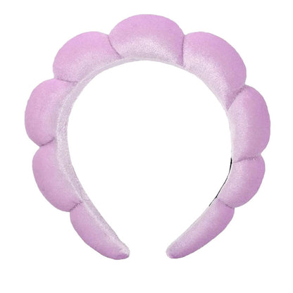 A towel fleece sponge twist headband