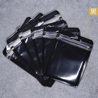 A Macaron color self-sealing bag, holographic bag, thickened transparent color bone bag, jewelry, sealed pocket, makeup brush, packaging bag.