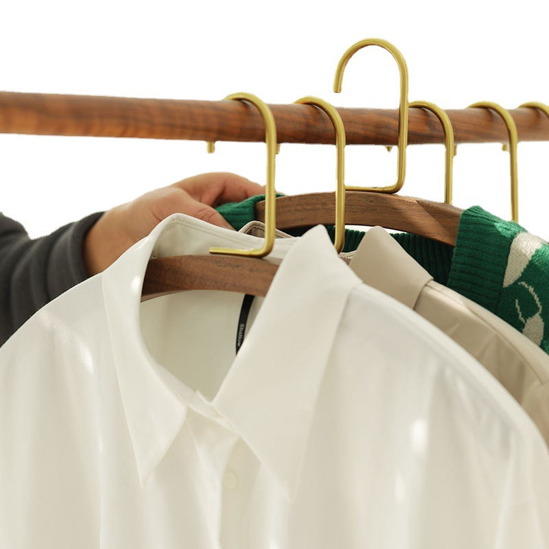A semi-circular black walnut solid wood hanger
