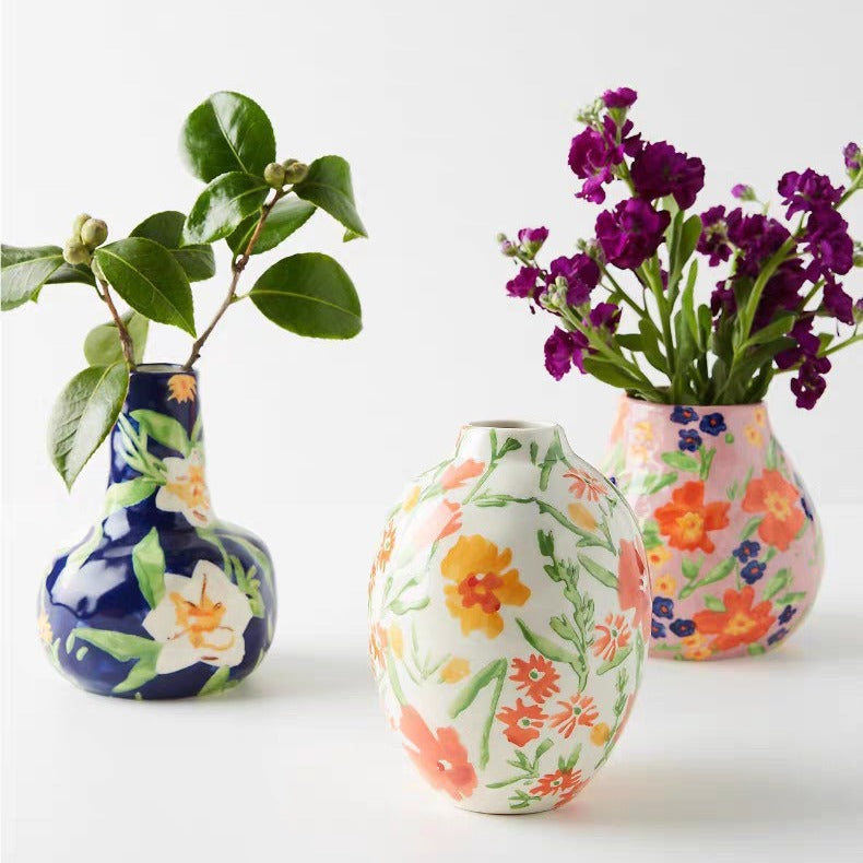 A colorful hand-painted ceramic vase ornament