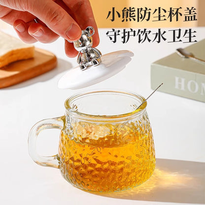 A bear mug a glass cup