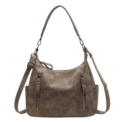 A handbag shoulder messenger bag