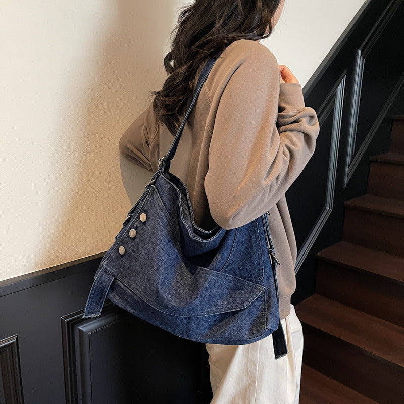 A denim shoulder bag